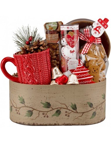 Kalėdiniais skanėstais užpildyta dėžutė